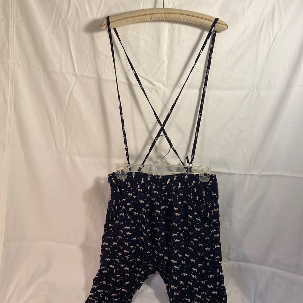 Super cute cat or dog print pants with overall type straps. Has pockets.